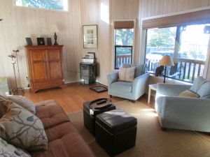 The bedrooms are behind me as I shoot this photo; the front door is to the right; the kitchen is to the left. Come visit and see for yourself!