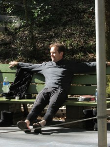 John between swings.John also climbs/flys with bare feet ... he's experienced enough to do it all in bare feet and to know enough to wear sandals in between swings (no dirt on HIS face!).