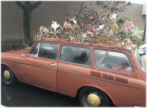 A Volkswagon with sculpture as roof - fantastic!